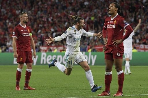 Pemain Real Madrid Gareth Bale rayakan gol ke gawang Liverpool di final Liga Champions 2017/18 yang digelar di Olimpiyskiy Stadium, Kiev, Ukraina, 26 Mei 2018. [AFP]