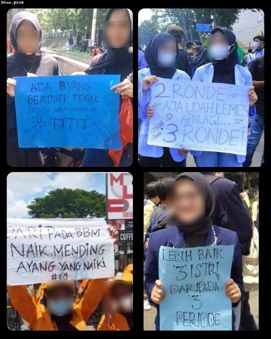 Massa demo bawa poster tulisan tak senonoh. (Twitter)