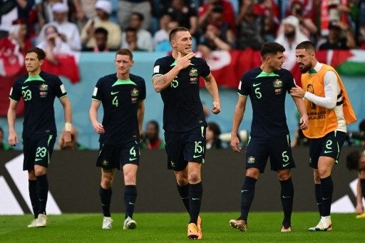 Pemain Australia Mitchell Duke rayakan golnya ke gawang Tunisia dalam pertandingan Piala Dunia 2022 yang digelar di Al Janoub Stadium, Sabtu (26/11/2022). [AFP]