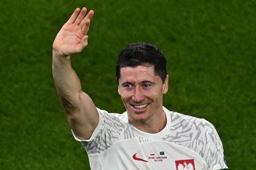 Pemain Polandia Robert Lewandowski rayakan golnya ke gawang Arab Saudi dalam pertandingan Grup C Piala Dunia 2022 yang berlangsung di Educational City Stadium, Sabtu (26/11/2022). [AFP]