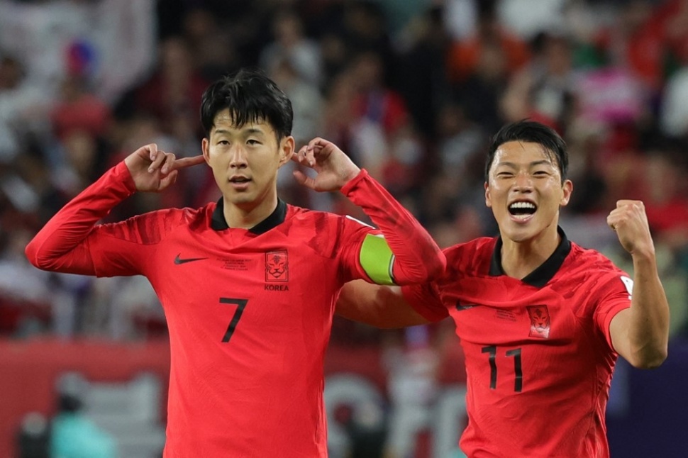 Gelandang Korea Selatan Son Heung-min merayakan golnya ke gawang Australia di babak perempat final Piala Asia 2023 yang digelar di Stadion Al-Janoub di al-Wakrah, selatan Doha, pada 2 Februari, 2024.Giuseppe CACACE / AFP