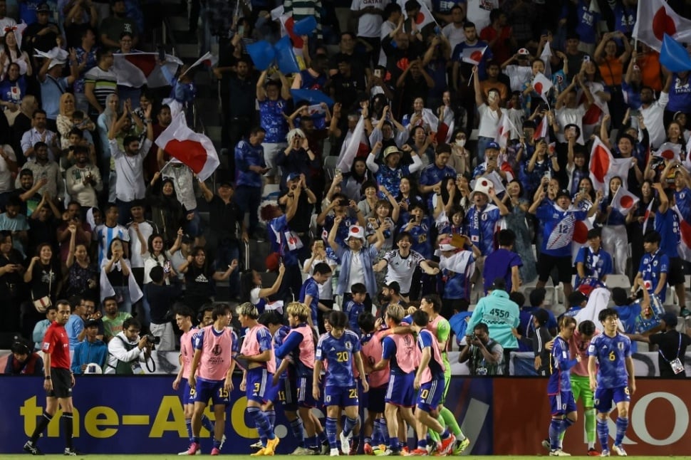 Pemain Jepang merayakan gol pada pertandingan final Piala Asia U23 AFC Qatar 2024 antara Jepang dan Uzbekistan di Stadion Jassim Bin Hamad di Doha pada 3 Mei 2024.KARIM JAAFAR / AFP