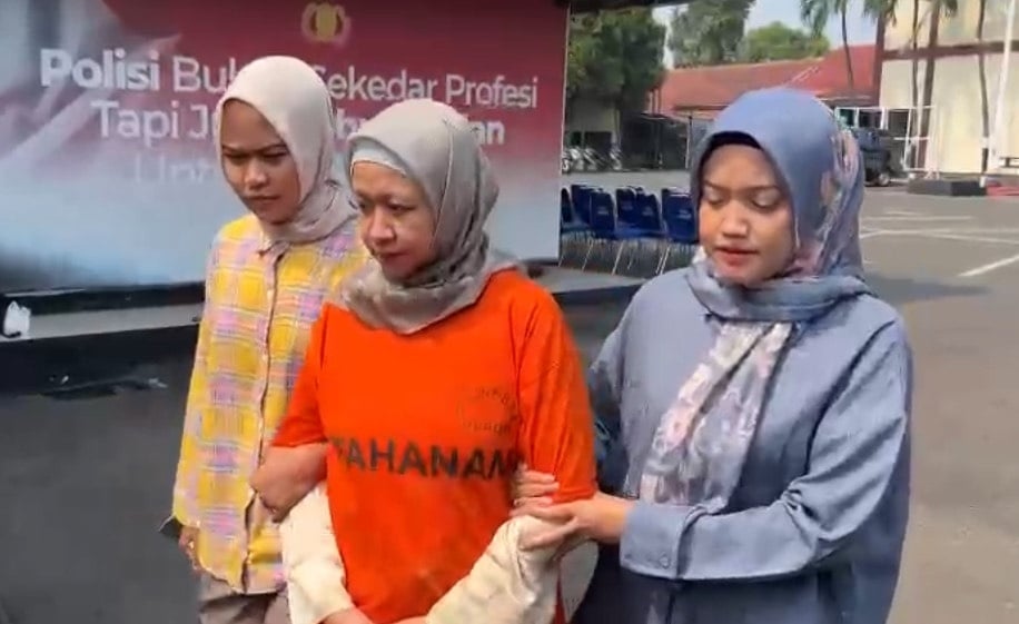 Meita Irianty ditetapkan menjadi tersangka penganiayaan anak di daycare Depok. (Suara.com/Faqih)