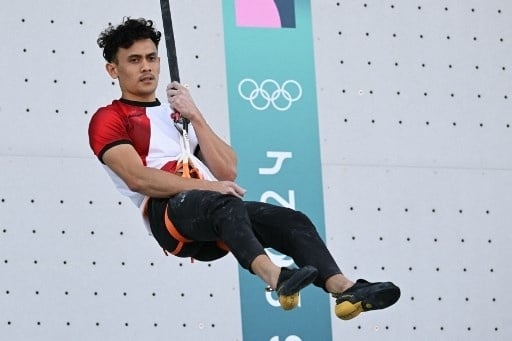 Veddriq Leonardo, atlet panjat tebing kebanggaan Indonesia, berhasil mengukir sejarah baru di ajang Olimpiade Paris 2024. (AFP)