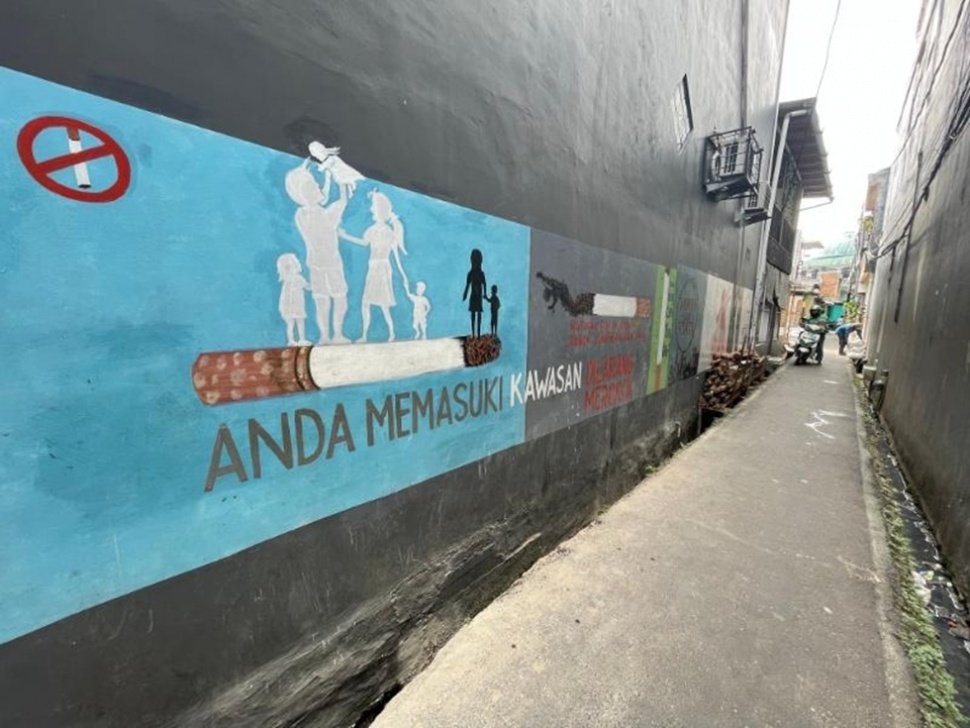 Swadaya Warga Matraman Merawat Kawasan Tanpa Rokok. (Suara.com/Adiyoga)