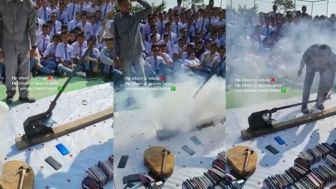 Viral, Netizen Kritik Sekolah yang Hancurkan HP di Depan Siswa