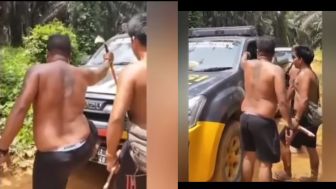 Mobil Polisi Ditahan di Kebun Sawit sama Pria Bertato, Warganet: Tangkap Aja