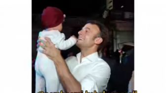 Viral! Cium Bayi Warga di Pinggir Jalanan Bali, Presiden Prancis Malah Disebut Pencitraan: Saingan Berat Anies di 2024
