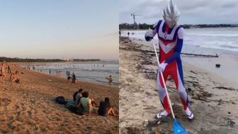 Viral, Superhero Ultraman Bersihkan Pantai Kuta Bali dari Sampah Kiriman