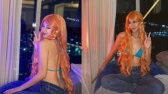 Pakai Bikini Hijau, Cantiknya Anya Geraldine Cosplay Jadi Nami One Piece