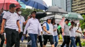 Simbol Serbet yang Dibawa Mahfud MD Saat Jalan Sehat di CFD Sudirman