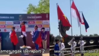 Pengibaran Bendera Pemenang SEA Games Kamboja Dipegang Manusia