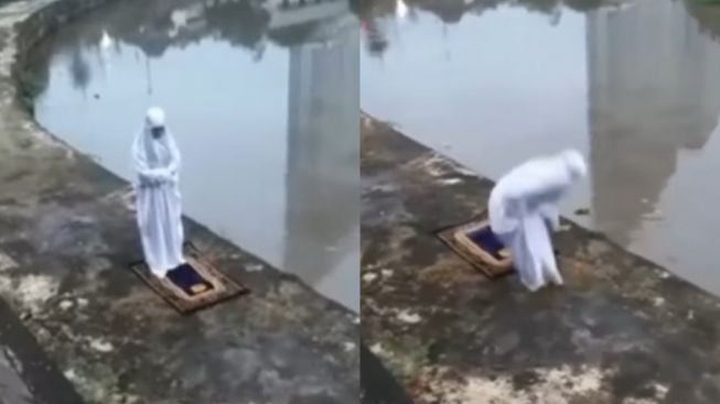 Viral Ibu-ibu Sholat di Pinggir Sungai, Setiap Satu Rakaat Maju Selangkah