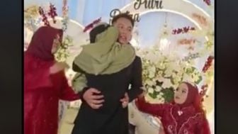 Bikin Panik Sepelaminan, Viral Tamu Berhijab Prank Peluk Pengantin Laki-Laki