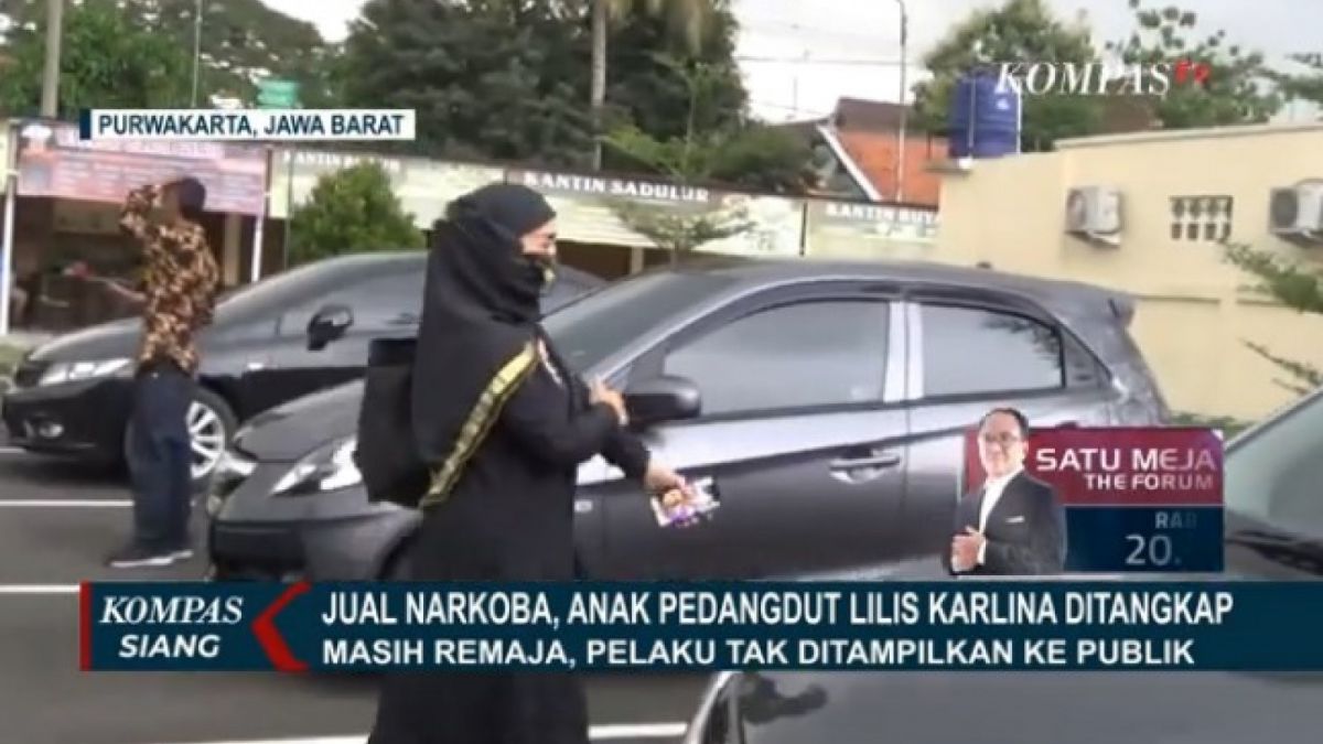 Lilis Karlina dalam busana muslim [screenshot Kompas TV]
