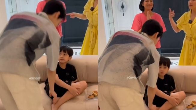 Rafathar Tetap Kalem meski Kaki Ditowel Doyoung NCT, Bikin Heboh Warganet: Sambil Makan Kue Pukis Lagi