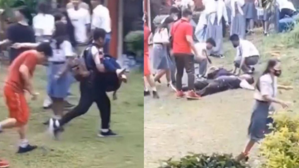 Tangkapan layar pria menolong perempuan pingsan [Twitter/@infotwitwor_]