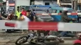 Awas! Pengendara yang Nekat Trobos Palang Perlintasan Kereta Bisa Kena Pidana, Ini Undang-undangnya