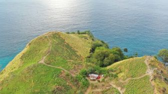 Berwisata ke Likupang Minahasa, Keindahan Pantai dan Bukit yang Menyatu