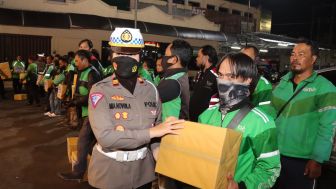 Polres Purbalingga Salurkan Bantuan Bagi Pengemudi Ojek Online