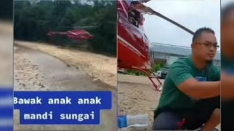 Video Seorang Pria Bawa Keluarga Mandi di Sungai dengan Naik Helikopter Viral, Warganet: Ini Baru Sultan