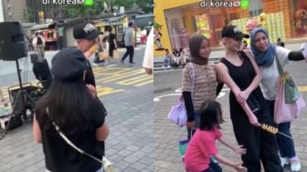 Lagi Asyik Ngemil Sambil Jalan-jalan di Korea, Sikap Agnez Mo saat Diajak Foto oleh Fans Curi Perhatian!