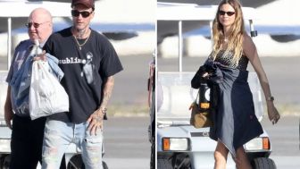 Tak Peduli Isu Perselingkuhan, Adam Levine dan Behati Prinsloo Naik Jet Pribadi ke Las Vegas