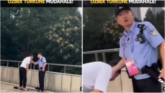 Viral! Penonton Asian Games Asal Uzbekistan Dihadang Polisi China Saat Shalat