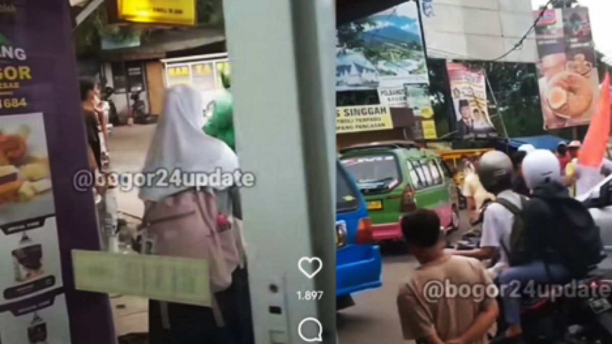 Screnshoot video pria duduk di atas mobil sambil kibarkan bendera merah putih [suara]