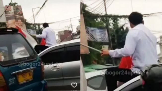 Geger Pria Duduk di Atas Mobil Teriak-teriak 'Saya Dibunuh Pemerintah'