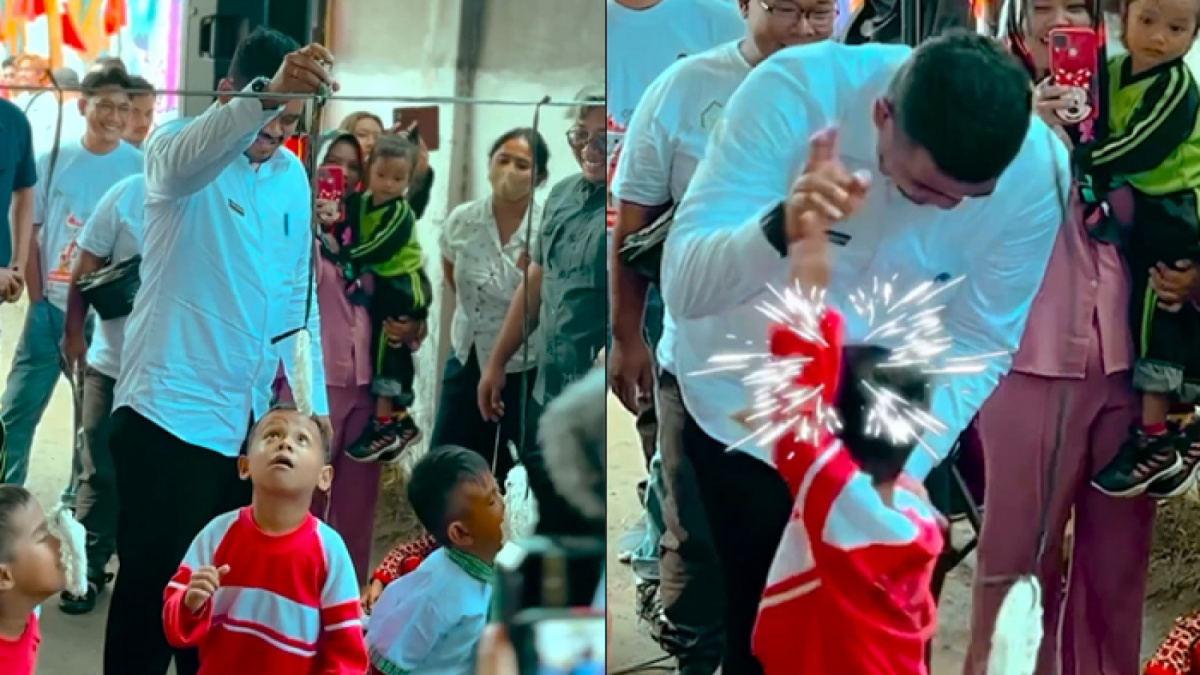 Wali Kota Medan Bobby Nasution tarik tali kerupuk anak PAUD yang ikut lomba. [Instagram @bobbynst]