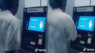 Bikin Emosi, Pria Ini Ambil Uang di ATM Tapi Kartunya Tak Dimasukkan ke Mesin