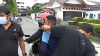 Tukang Parkir Viral Aniaya Driver Taksi Online di Medan Ditangkap