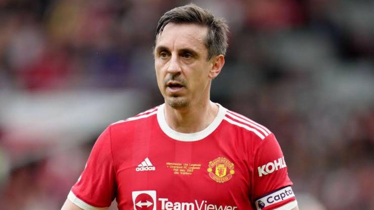 Gary Neville mengenakan seragam Man Utd. (AFP)